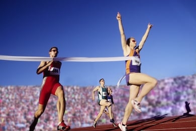 blurred view of an athlete crossing the finish line