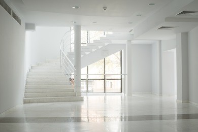 interior of a building with white color walls. flight of stairs