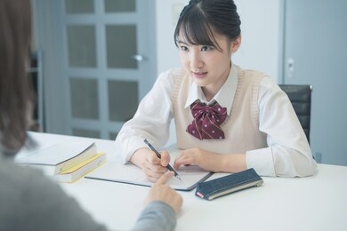 education concept of an asian high school girl. cram school. private teacher.