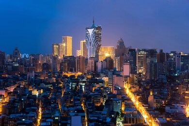 image of macau (macao), china. skyscraper hotel and casino building at downtown in macau (macao). asian tourism, modern city life, or business finance and economy concept
