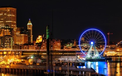 seattle waterfront and skyline illuminated at night. copy space
