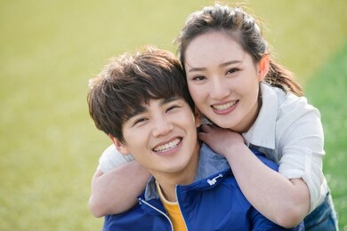 the young couple students in university