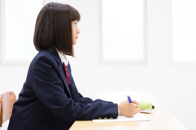 junior high school students studying at a cram school