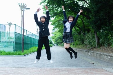 junior high school students jumping
