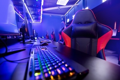 professional gamers cafe room with powerful personal computer game chair blue color. concept cyber sport arena.
