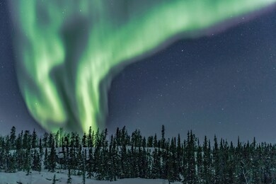 the aurora borealis in yellowknife canada in march on a frozen lake