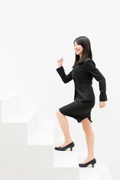 asian businesswoman on white stair