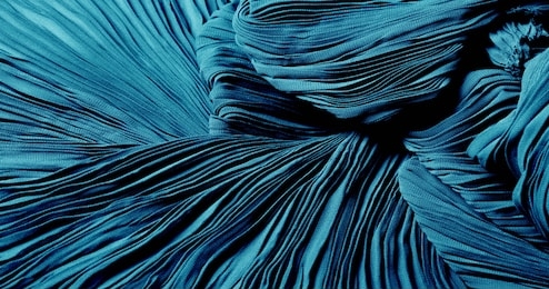 texture, background, pattern, cloth pleated blue. a shiny finished folded satin fabric is a light, glossy glossy and beautiful type of fabric that makes the design of the end stylish and glamorous