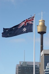 australian flag and centrepoint tower - sydney, australia