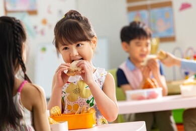 cute children eating delicious food