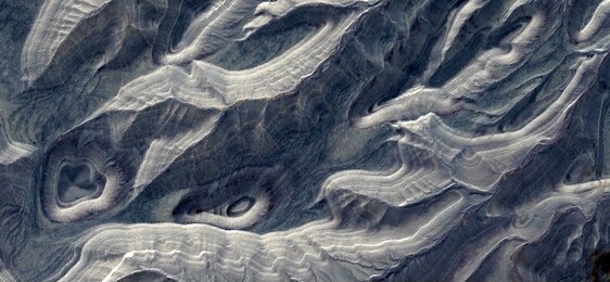 fear hides, abstract photography of the deserts of africa from the air. aerial view of desert landscapes, genre: abstract naturalism, from the abstract to the figurative, contemporary 