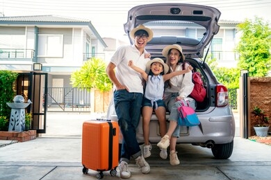 asian family going to holiday on summer vacation before start from home. car travel concept.