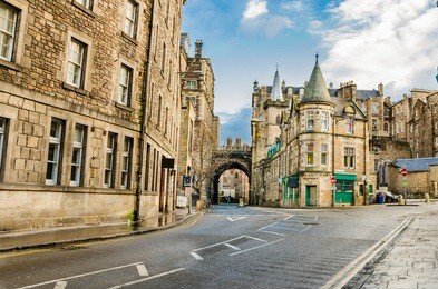a street in old town edinburgh on sunny winter day