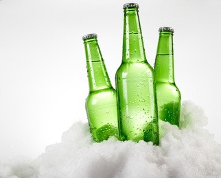 beer bottles in snow