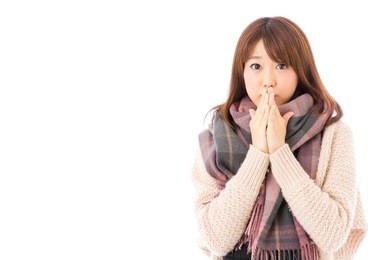 fashionable young asian woman on white background