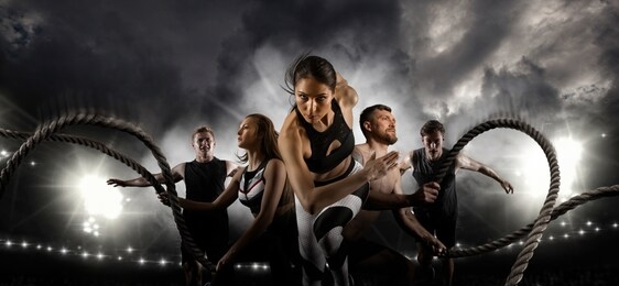 sport collage. men and woman running on smoke background. sports banner. horizontal copy space background