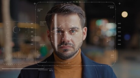 future. face detection. technological 3d scanning. biometric facial recognition. face id. technological scanning of the face of handsome businessman for facial recognition. shoted by arri alexa mini