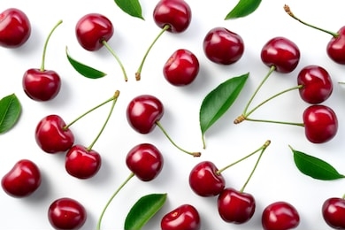 cherries. cherry background. cherries top view. cherry with leaves on white background.