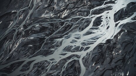 aerial perspective of glacier river in iceland on the way to thórsmork, highlands.