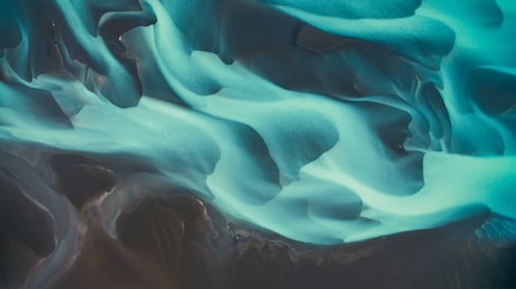 aerial drone view of a huge riverbed and delta, glacial river system transporting deposits from the solheimajokull glacier,iceland