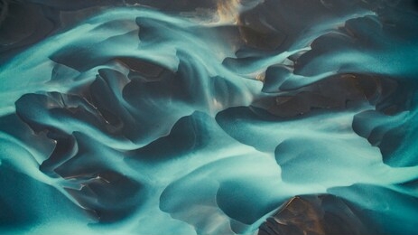 aerial drone view of a huge riverbed and delta, glacial river system transporting deposits from the vatnajokull glacier,iceland
