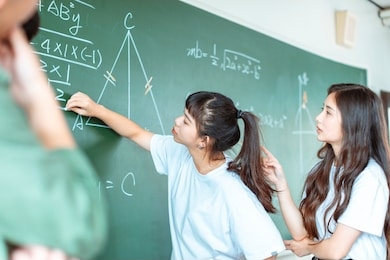 group of students working on the mathematical problem