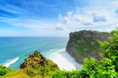 coast at uluwatu temple, bali, indonesia.
