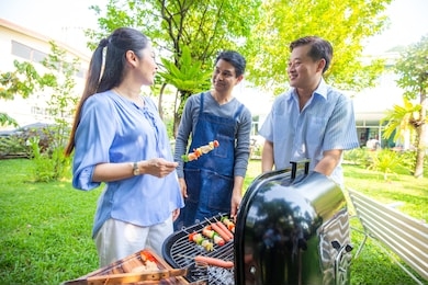 happy elderly asian friend with barbecue grilled food party in park, senior meeting