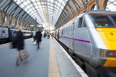 london train station blur people movement in rush hour, king cross station 