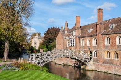 mathematical bridge, cambridge, england. officially known as wooden bridge it was designed by william etheridge in 1749; connects two parts of queens' college, part of the university of cambridge.