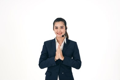 customer call center service care digital technology connect with work concept. greeting of new gen young business smile asian woman with headphone. white background with copy space