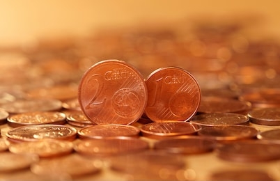 abolition of one and two cent euro coins. europeans in favour of abolishing 1 cent and 2 cent coins. euro currency coin. coins background. income and profits. banking, economics, saving money. 
