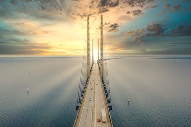 beautiful aerial view of the oresundsbron bridge between denmark and sweden, oresundsbron. oresund bridge close up view at sunset.