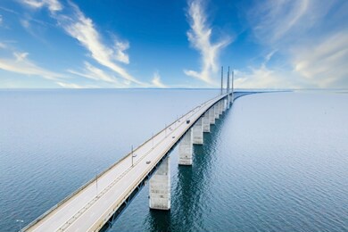 aerial view of the bridge between denmark and sweden, oresundsbron during bright sunny day.