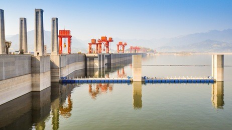 lakeside view of the three gorges dam on a  misty day - sandouping, yichang, china