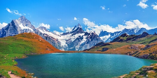 sunset view on bernese range above bachalpsee lake. peaks eiger, jungfrau and faulhorn in famous location. switzerland alps, grindelwald valley