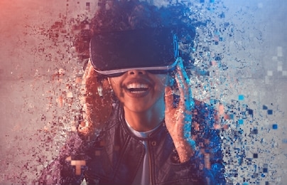 happy african female in vr headset laughing and falling into particles while immersing into virtual reality