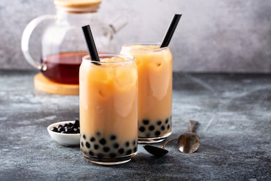 milk bubble tea with tapioca pearls and honey