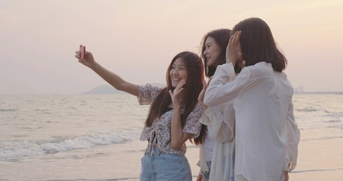 selfie camera smartphone with friends group young women snapshot taking photo on summer beach travel, happy people lifestyle activities  