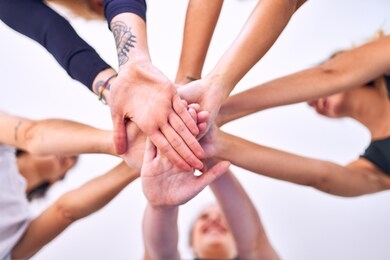young beautiful sportwomen doing gesture with hands