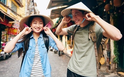 portrait of vietnamese tourists in hanoi city 