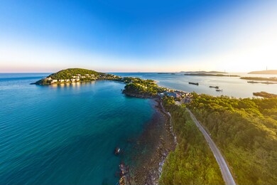 coastal resort scenery of ong doi cape, emerald bay, phu quoc island, vietnam, a tourism destination for summer vacation in southeast asia. sunset aerial view.