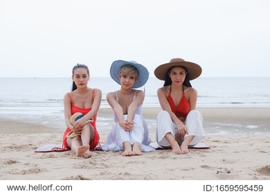 portrait three asian women, girls group friends having fun together on the beach 
