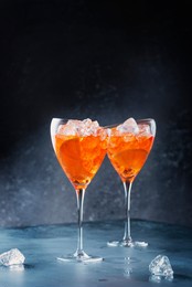 traditional italian aperitif aperol spriz with orange and ice, selective focus