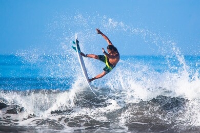 riding the waves. costa rica, surfing paradise