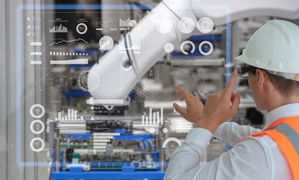 industry 4.0 robot concept .engineers are using virtual ar to maintain and check the work of human robot in the 4.0 smart factory.