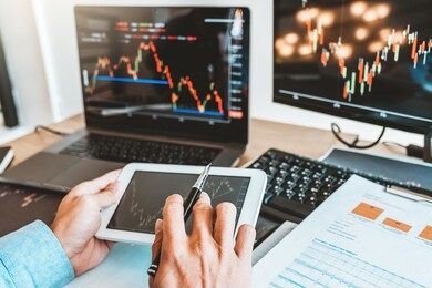business man deal investment stock market discussing graph stock market trading stock traders concept.