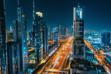 panorama of dubai downtown at night from above, united arab emirates.