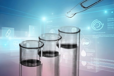 dropper over test tube dropping chemical sample