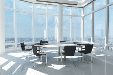 modern office with many windows and city landscape